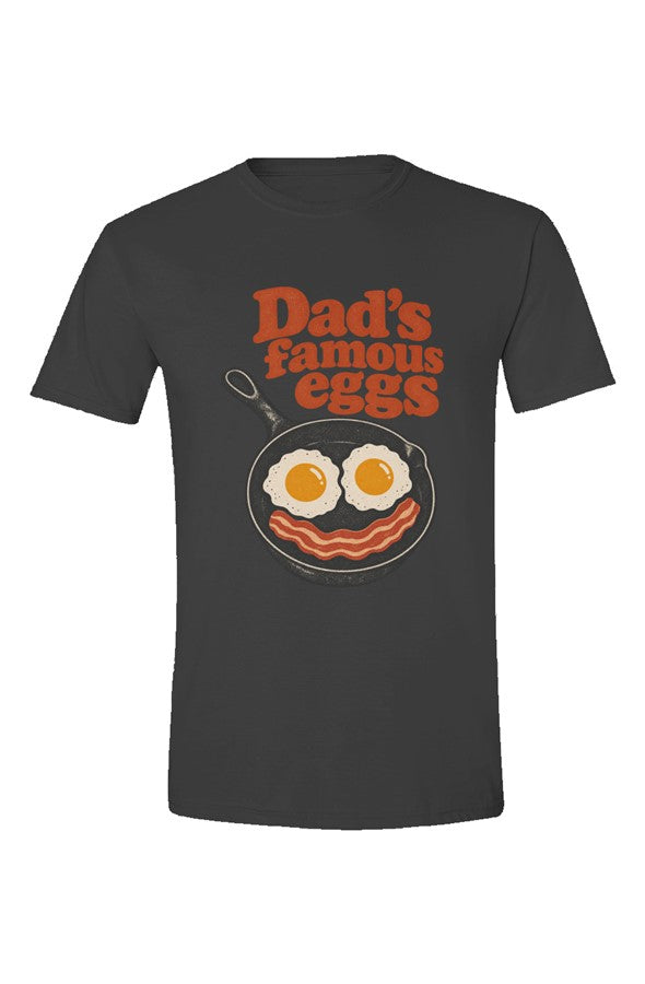 Charcoal t-shirt with Dad's famous eggs lettering over a skillet with eggs and bacon, flat front view on white.