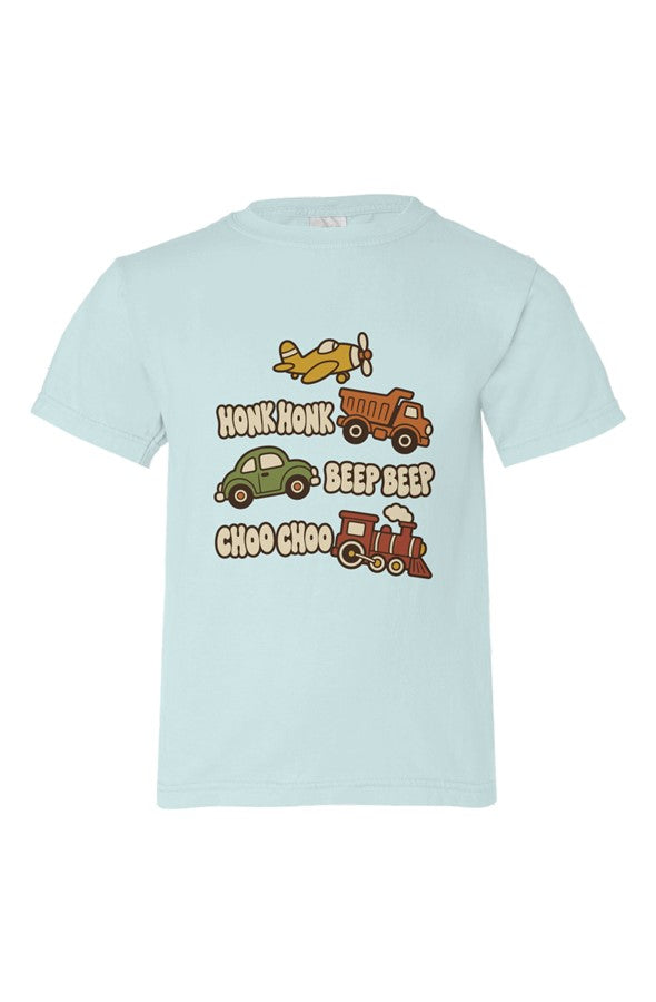 Light blue kids' t-shirt with a plane, dump truck, car and train beside HONK HONK, BEEP BEEP, CHOO CHOO lettering.