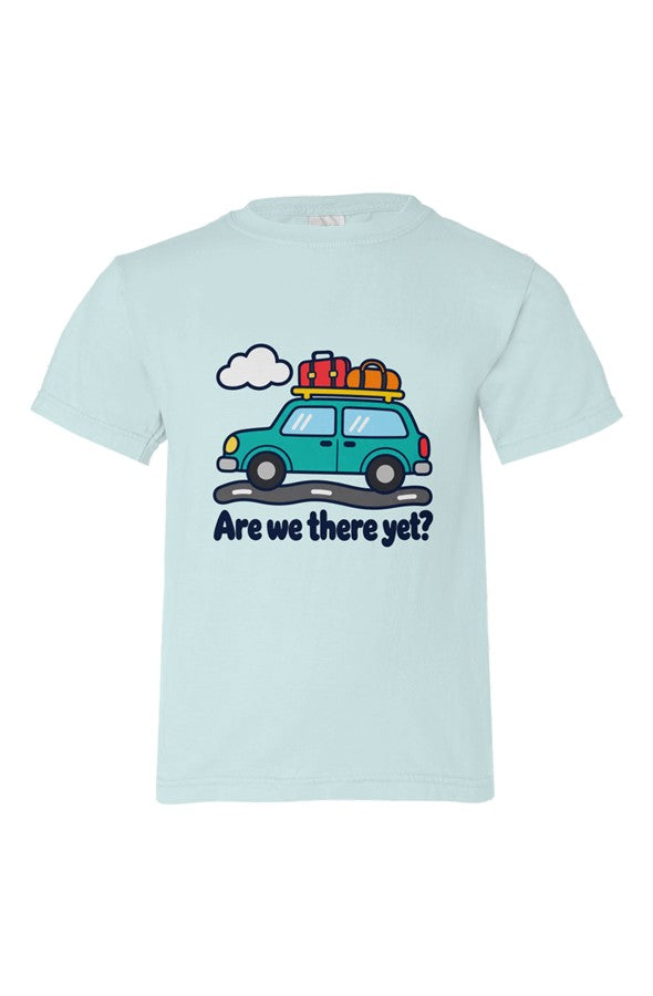 Light blue kids' t-shirt with a teal car loaded with luggage over Are we there yet? lettering.