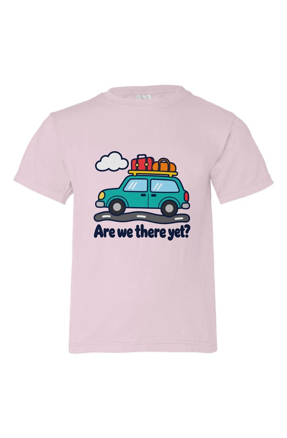 Light pink kids' t-shirt with a teal car loaded with luggage over Are we there yet? lettering.