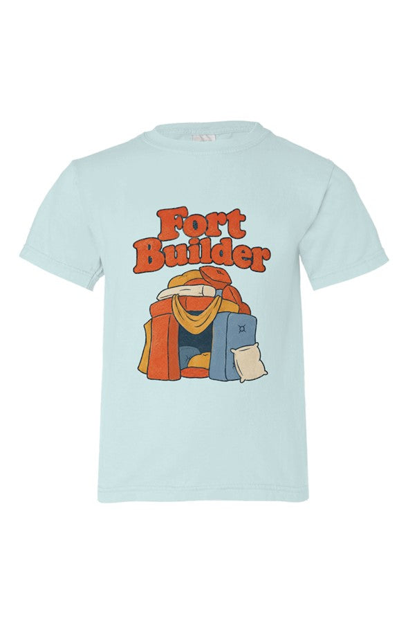 Light blue kids' t-shirt with Fort Builder lettering over orange and yellow blankets, blue and cream pillows.