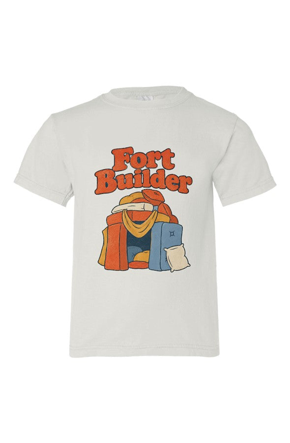 Cream kids' t-shirt with Fort Builder lettering over orange and yellow blankets, blue and cream pillows.